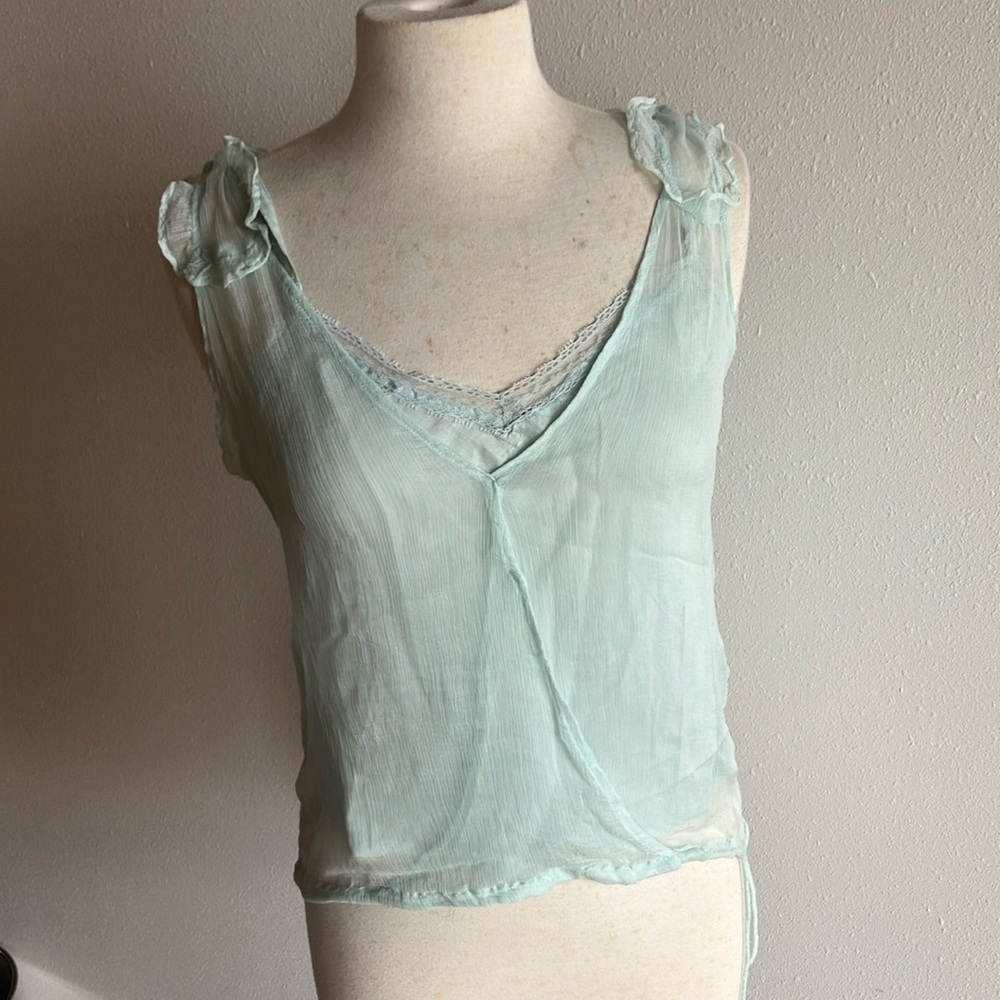 Light blue dainty top with removable under shirt.
